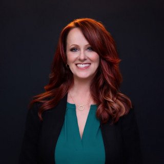 Crystal M. Etue