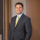 Tyler J. White