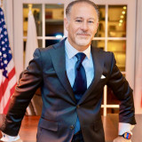 R.J.  Manuelian